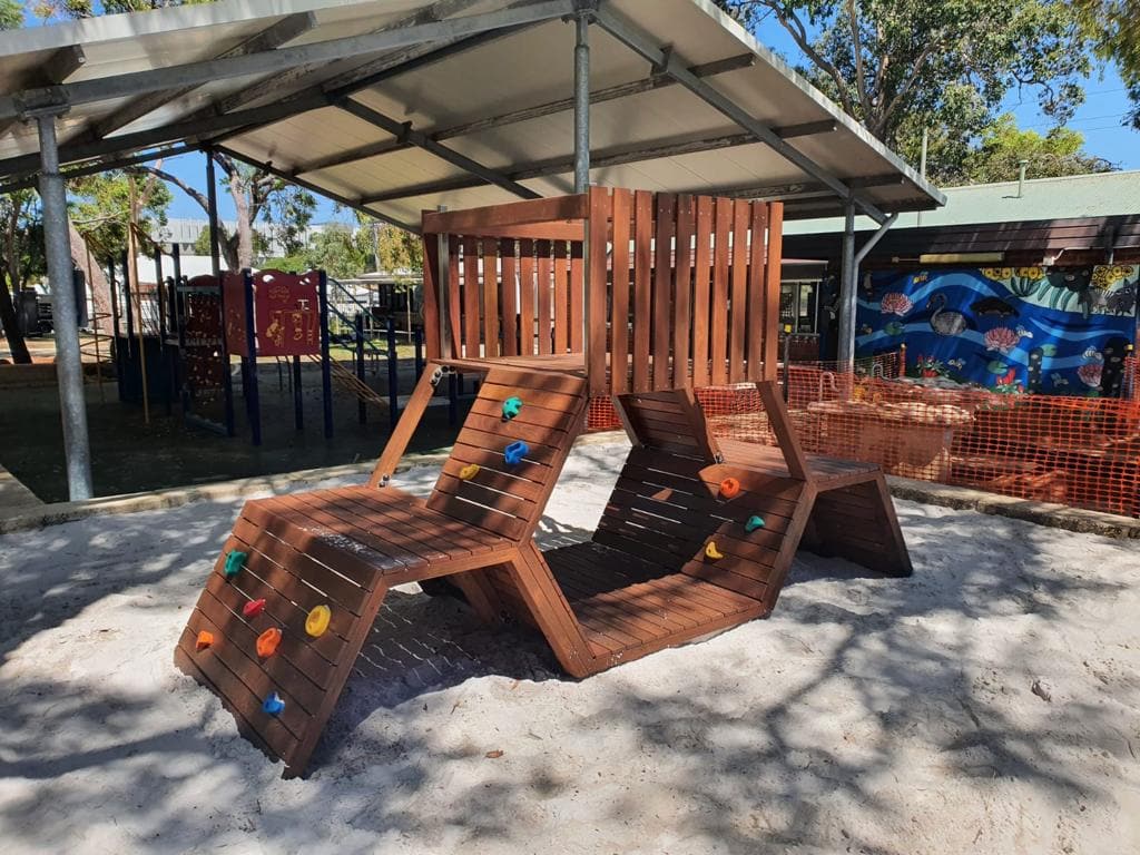 Bee Hive Climber Mini - Durable wooden play equipment with climbing features for children. Perfect for outdoor playgrounds, encouraging active play and motor skills development.