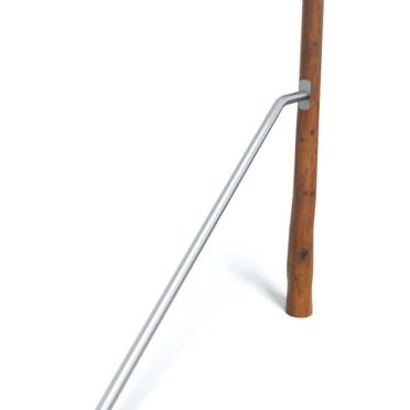 Wooden post with metal support for outdoor fitness or park equipment installation.