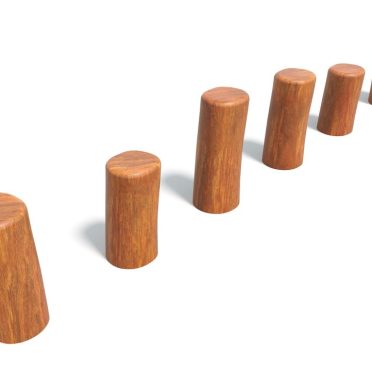 Six wooden cylinders arranged in ascending order from left to right, casting shadows on a white background.